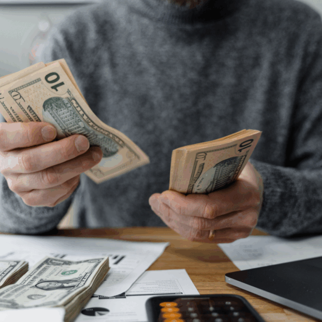 students learning about money management through financial literacy workbook